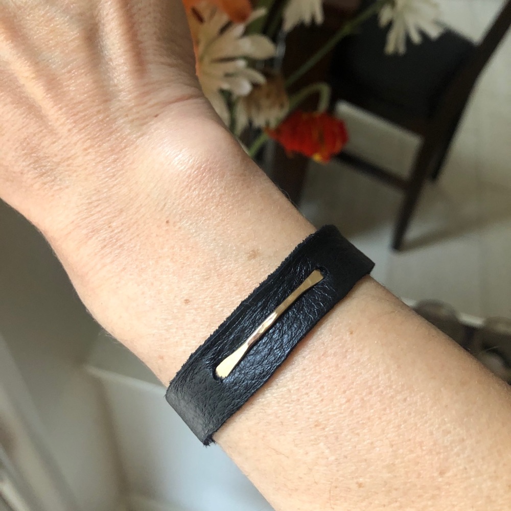 Leather cuff with gold bar